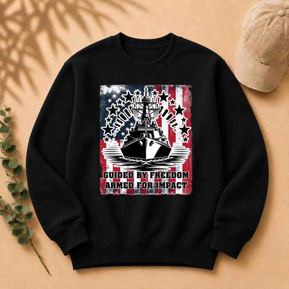 Black sweatshirt with a graphic design on a beige background