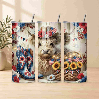 Three tumblers with a cow, boots, and American flag design on a wooden surface.