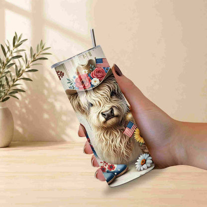 Person holding a tumbler with a llama design and American flag, on a light wooden surface.