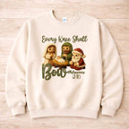 Every Knee Shall Bow Christmas Sweatshirt featuring a cozy design with adorable nativity characters.