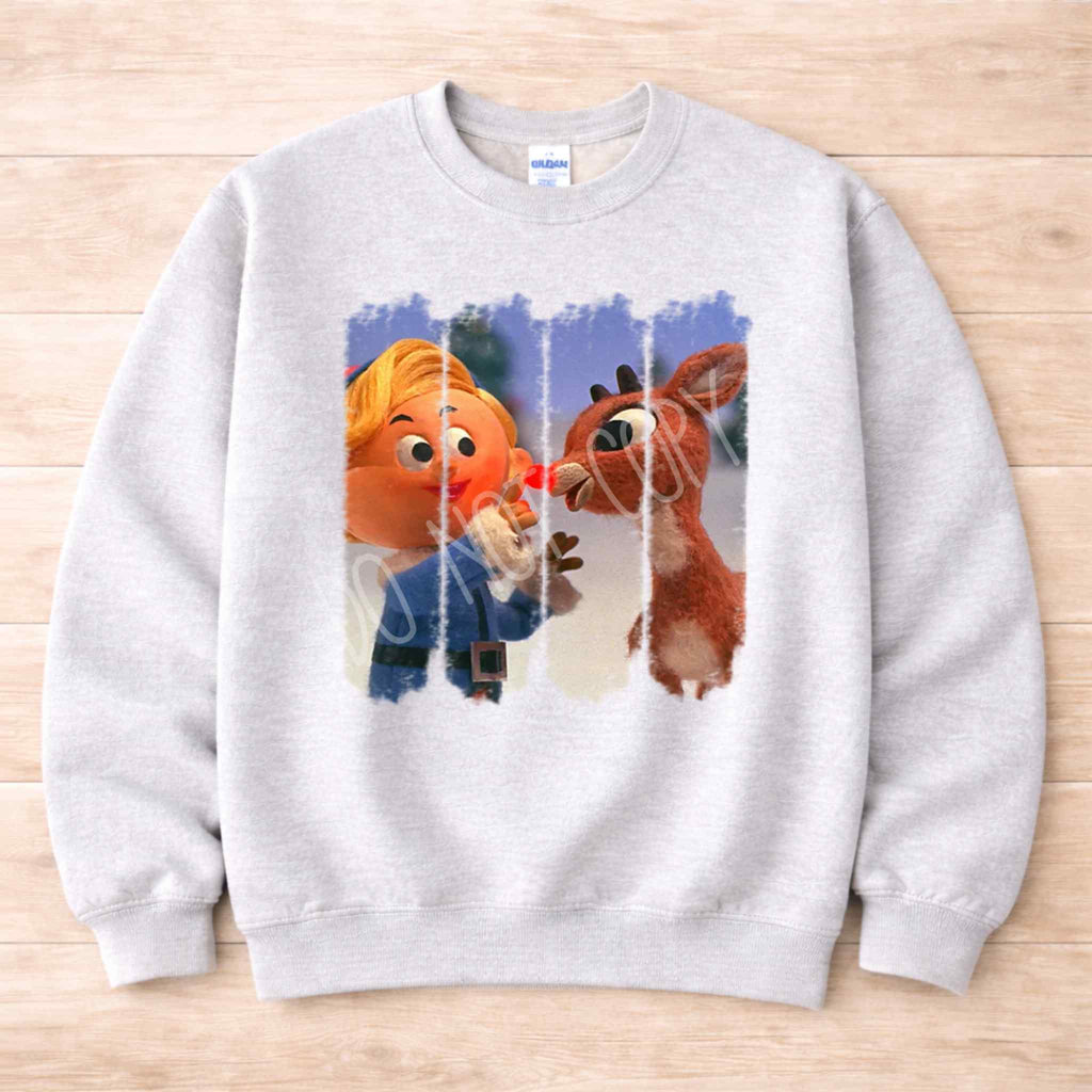 Christmas Elf & Reindeer Sweatshirt featuring a vintage design with an elf and reindeer for festive celebrations.