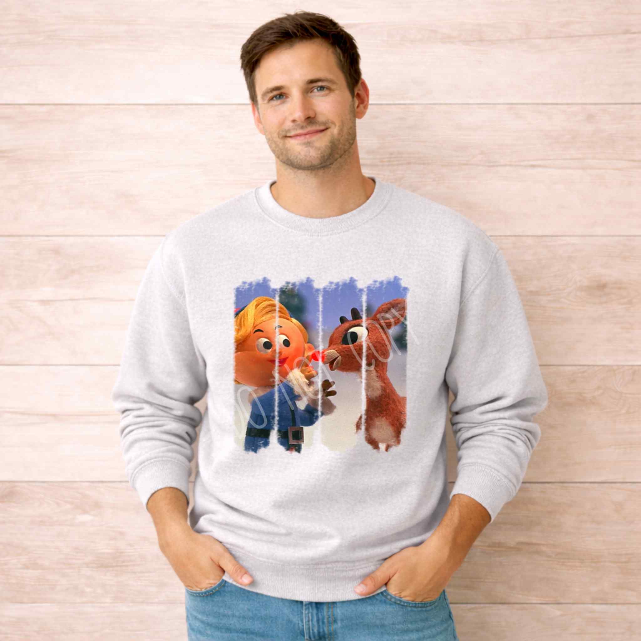 Man wearing a Christmas Elf & Reindeer Sweatshirt featuring charming elf and reindeer design on a cozy gray background.