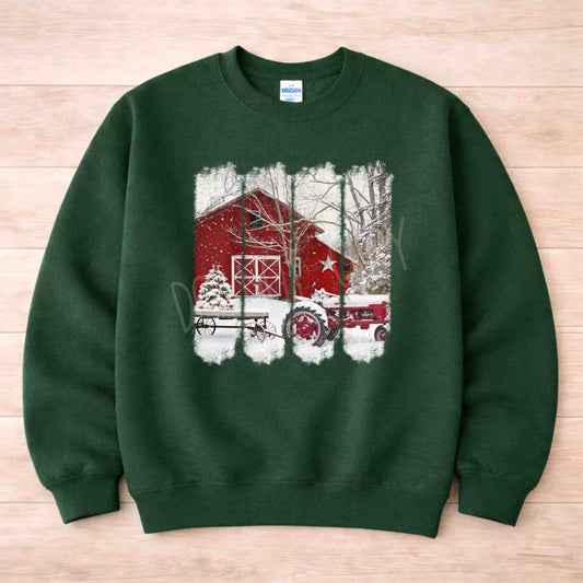Winter Barn Christmas Sweatshirt featuring a festive barn and tractor design on a cozy green background.