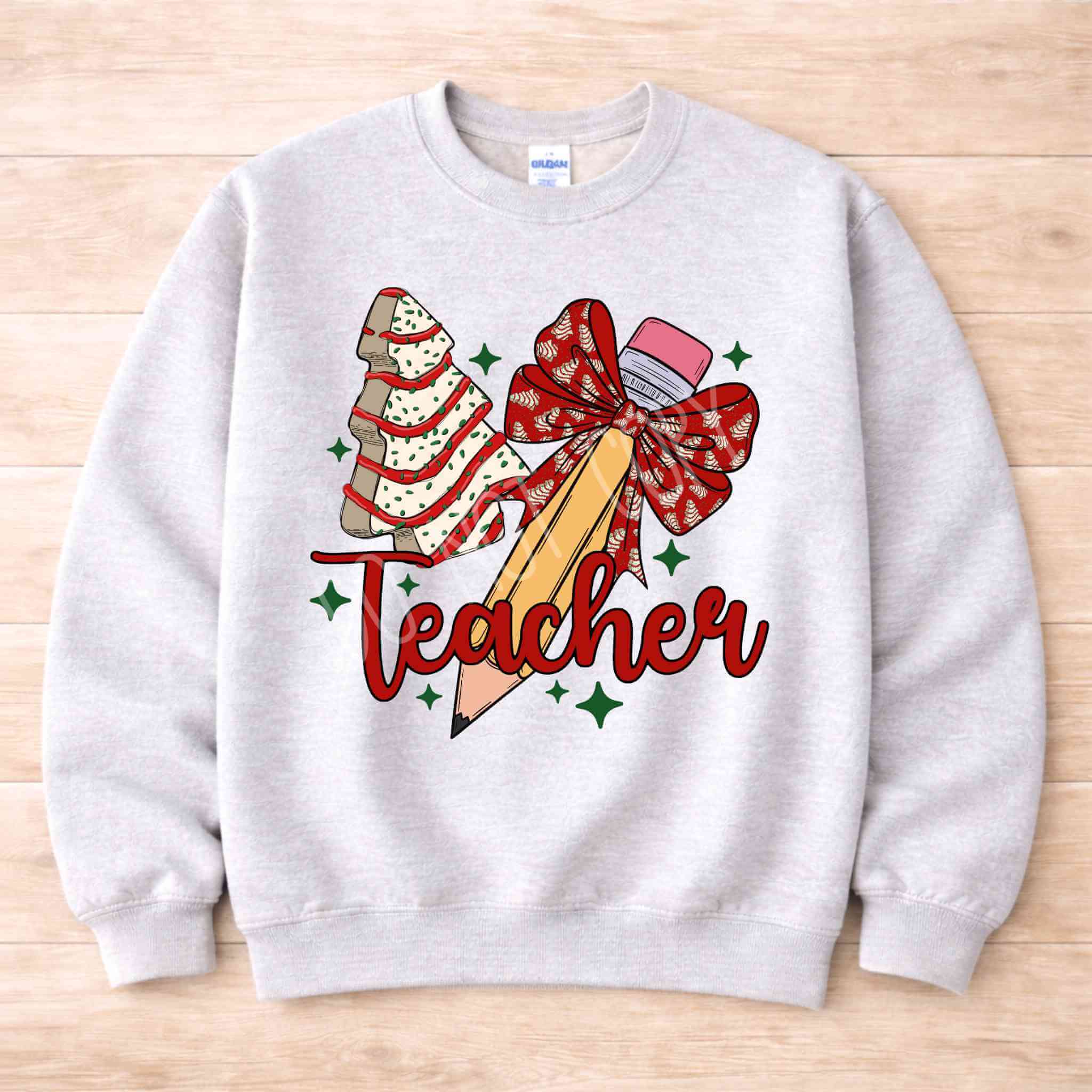 Teacher Christmas Sweatshirt Holiday Comfort and Style featuring festive design with pencil and bow.