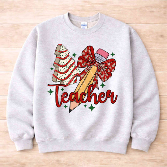 Teacher Christmas Sweatshirt Holiday Comfort and Style featuring festive design with pencil and bow.