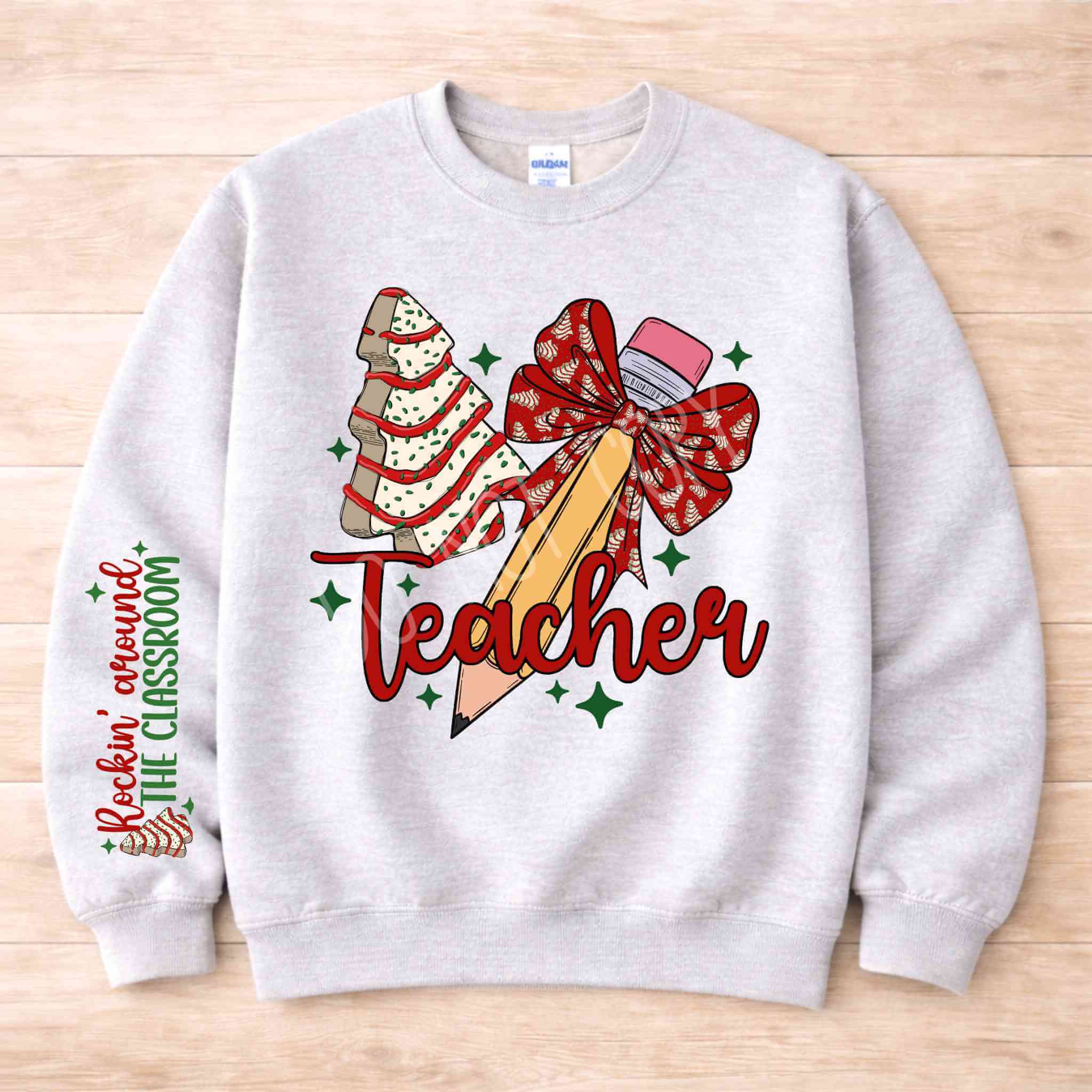 Teacher Christmas Sweatshirt Holiday Comfort and Style with festive pencil and bow design on cozy crewneck.