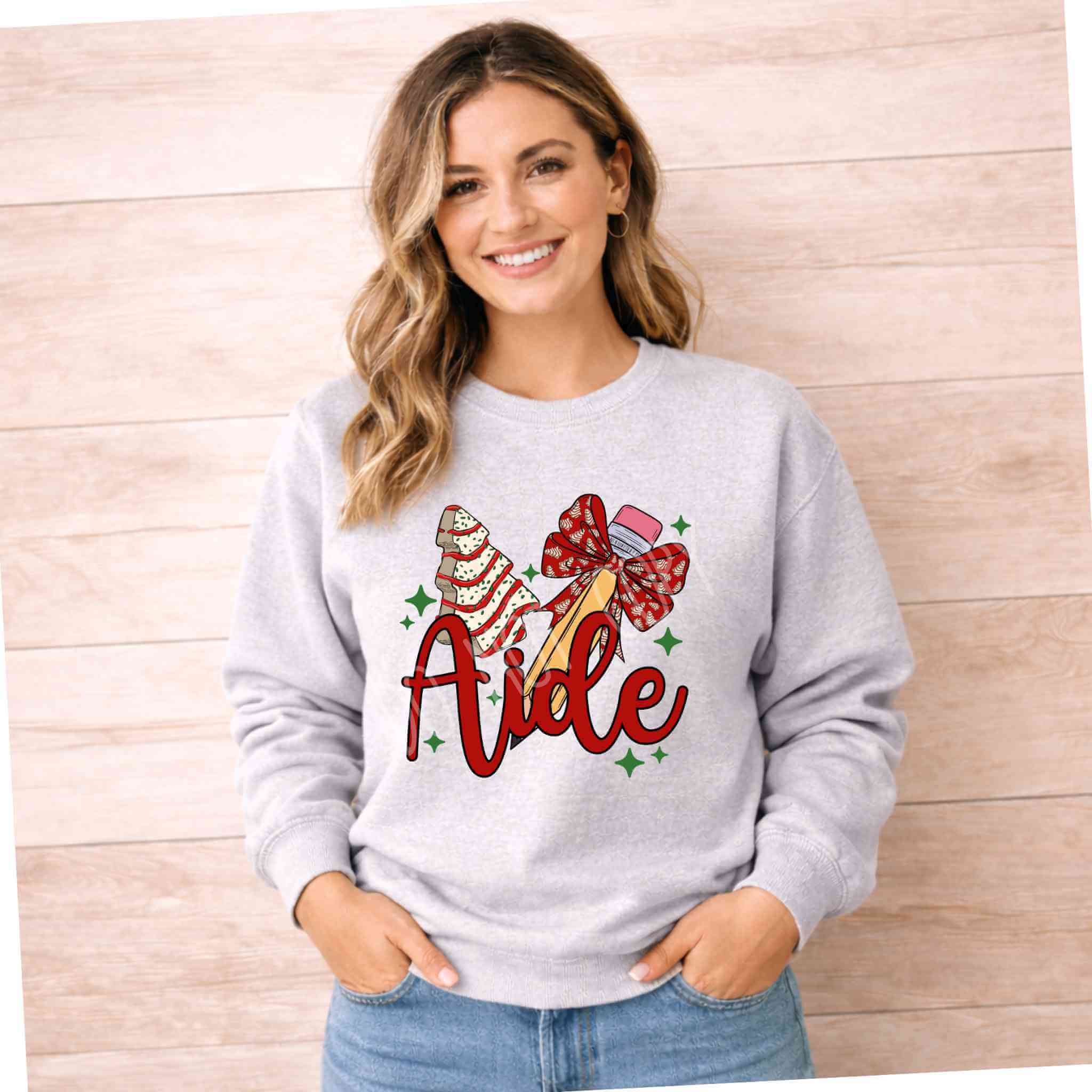 Teacher Aide Christmas Sweatshirt Holiday Comfort and Style featuring festive graphics and cozy design for teacher aides.