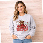 Beary Loved Nurse Sweatshirt Comfort Style and Care featuring a teddy bear and nurse-themed designs.