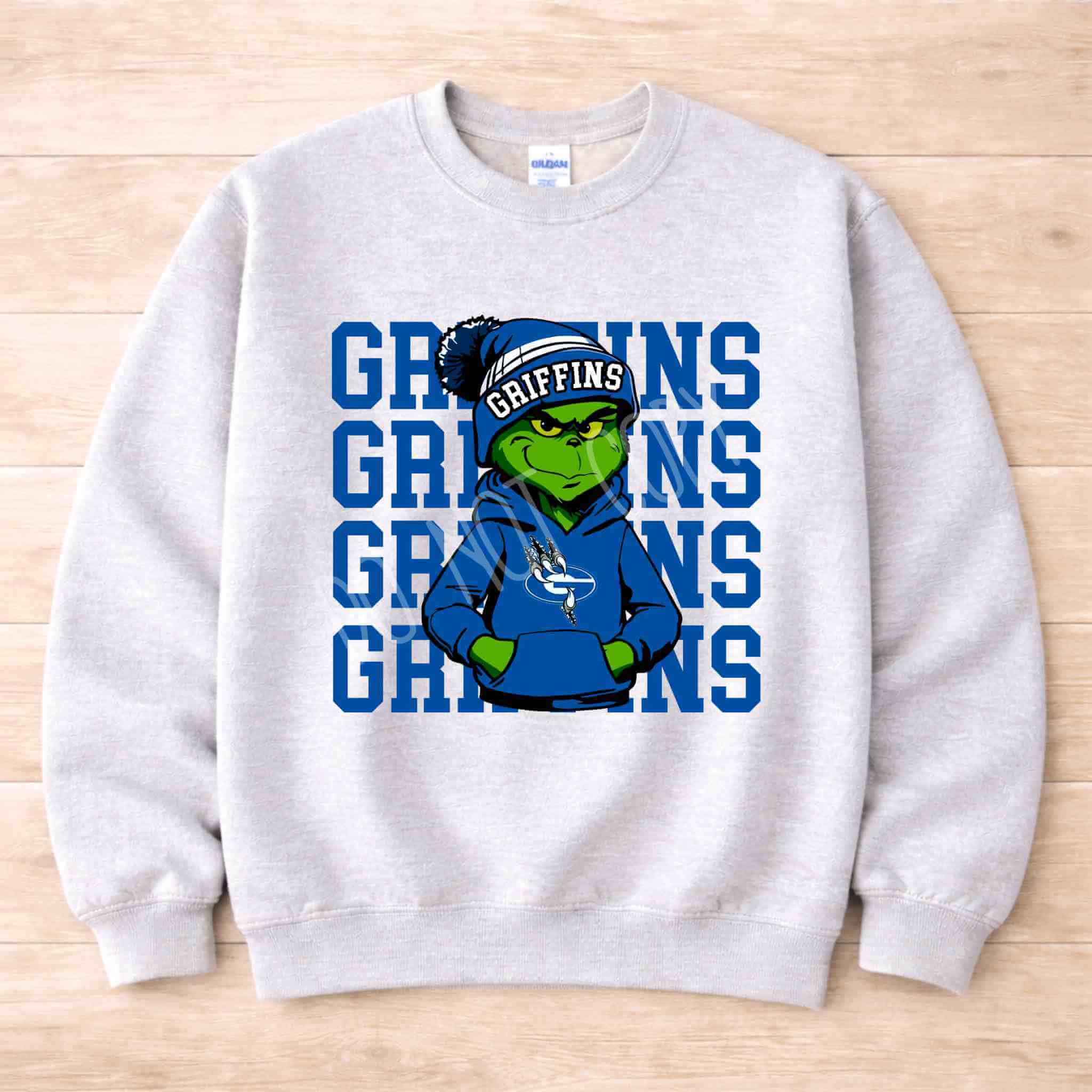 Griffins Crewneck Sweatshirt Youth Comfort and Style featuring a cool mascot in a blue hoodie.