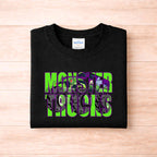 Monster Trucks Youth T Shirt Neon Green Purple Graphic Tee displayed on a black Gildan shirt, featuring vibrant truck graphics.