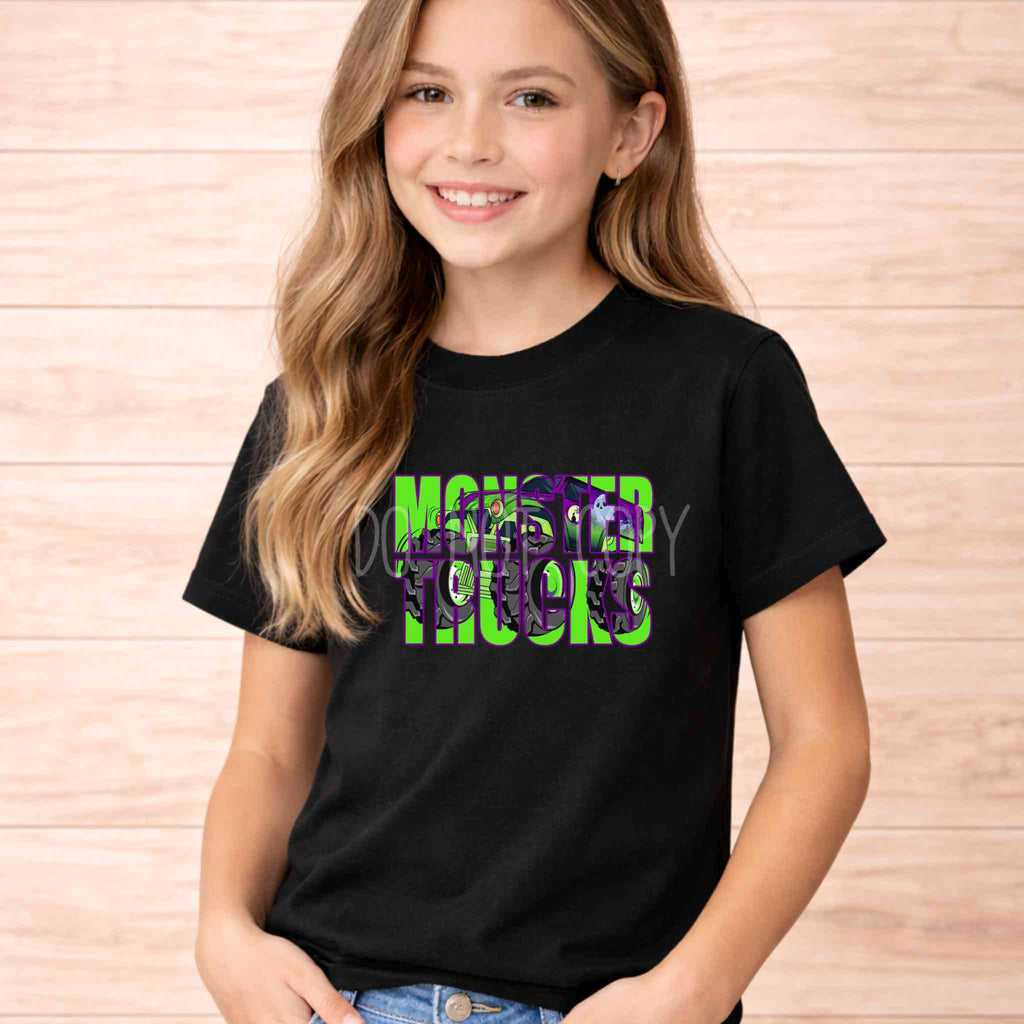 Monster Trucks Youth T Shirt Neon Green Purple Graphic Tee worn by a smiling girl in a black t-shirt