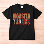 Monster Trucks Youth T Shirt Kid Graphic Tee featuring bold red lettering and a rugged truck graphic on a black background.