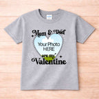 Mom And Dad Are My Valentines Kids T Shirt displayed on a gray background with customizable photo area.