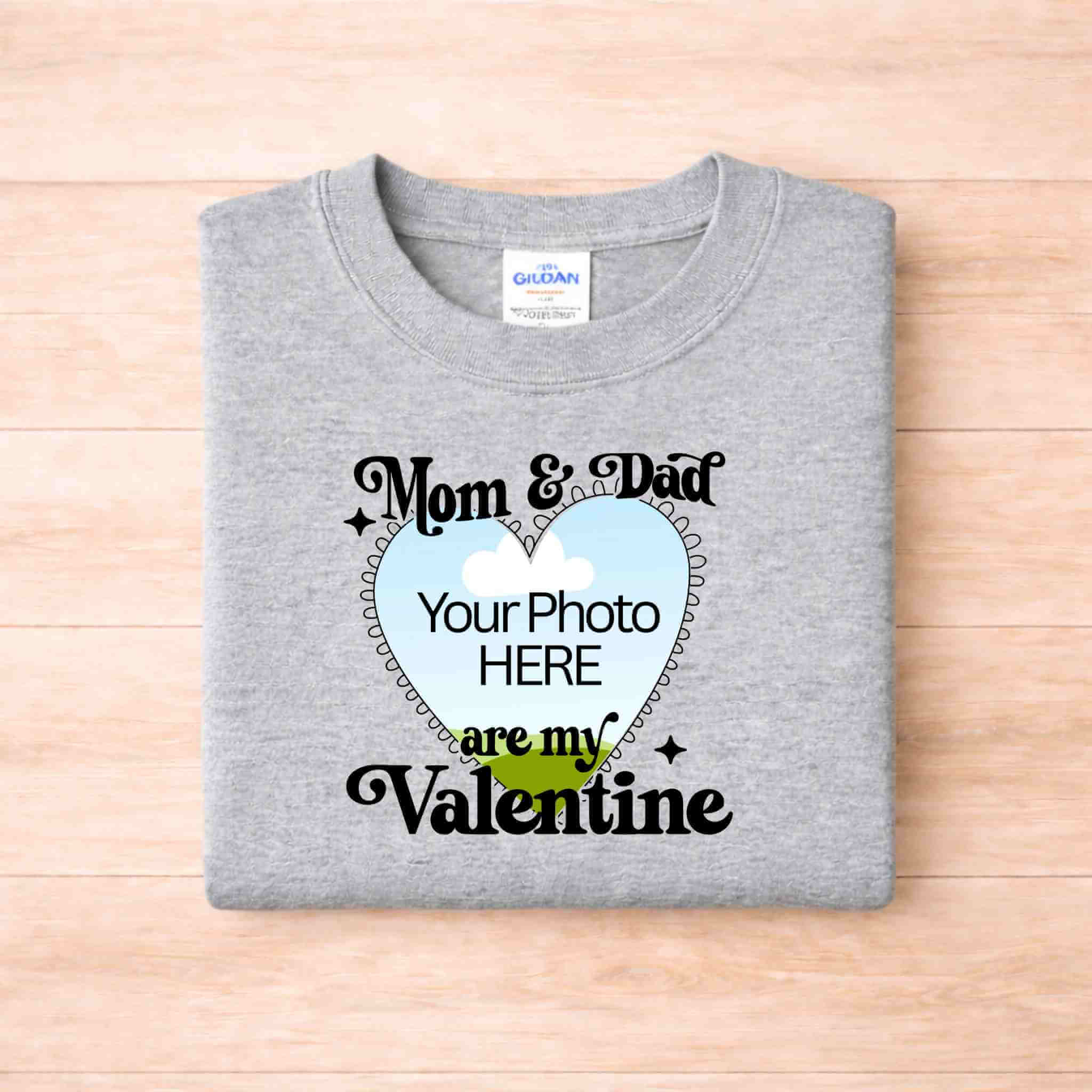 Mom And Dad Are My Valentines Kids T Shirt with customizable photo design on a grey background.