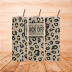 Leopard print tumbler with sassy quote 'Don't like me? Fuck off. Problem solved!' on a wooden background.