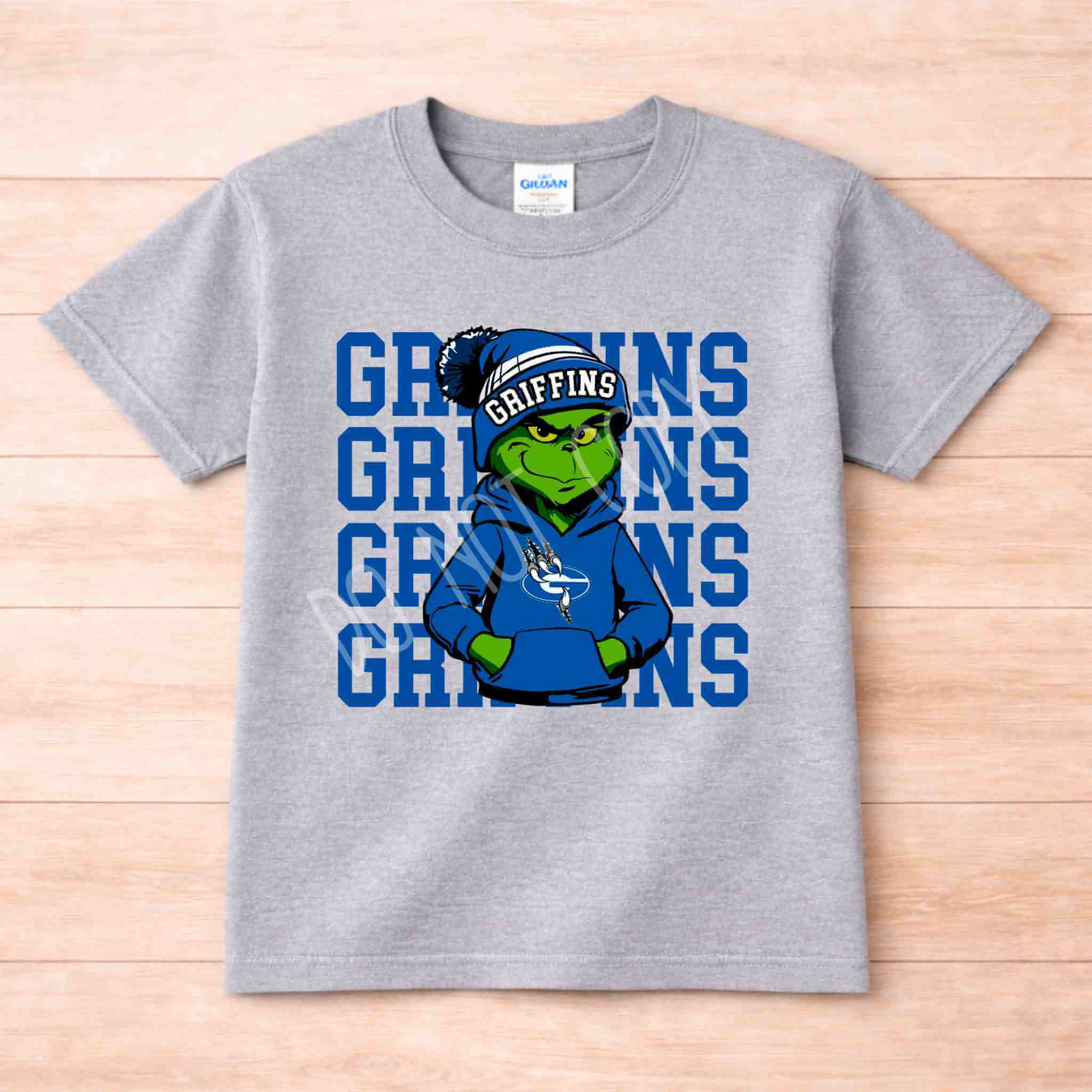 Griffins Graphic Tee Youth Comfort and School Spirit featuring a vibrant graphic design on a gray shirt.