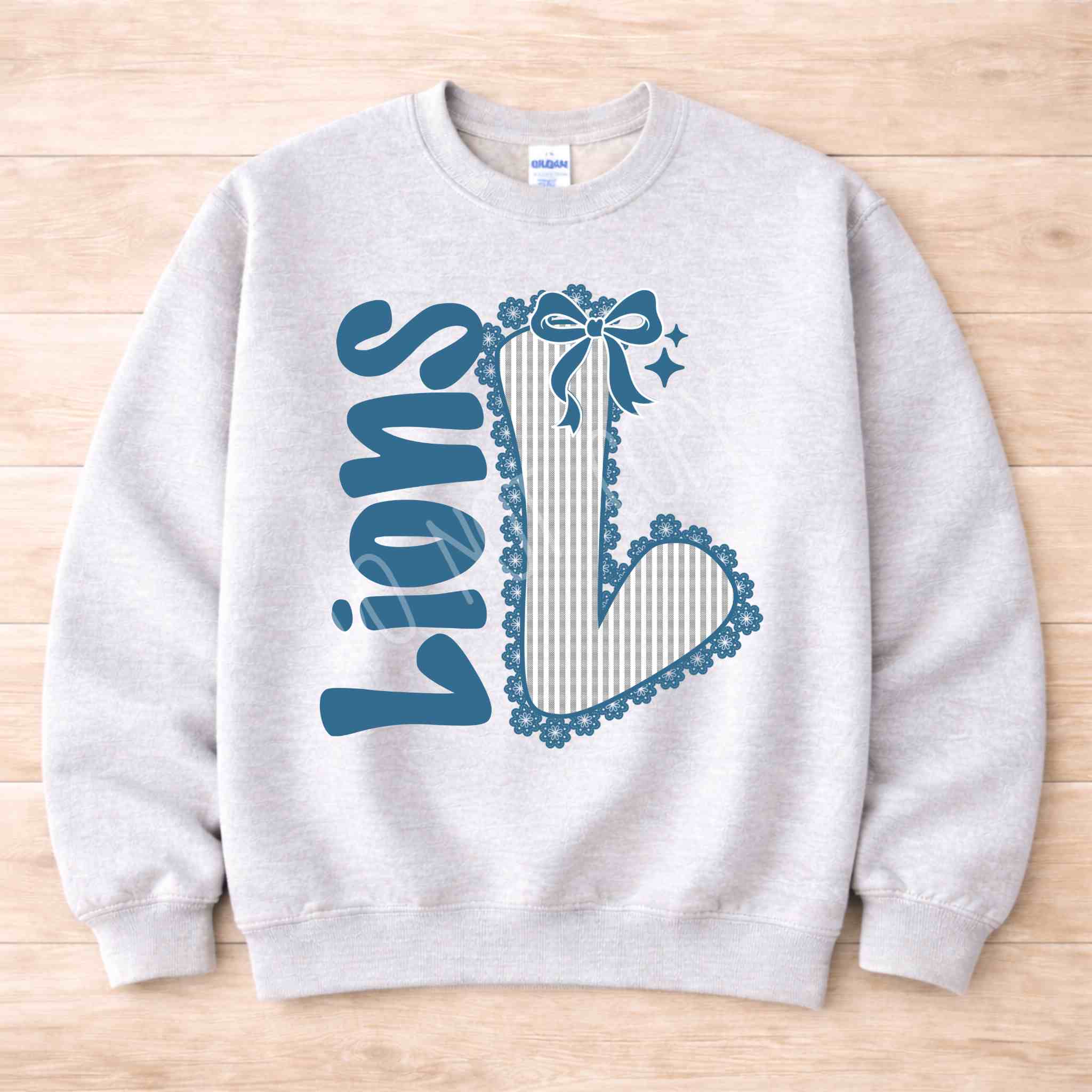 Lions School Spirit Sweatshirt featuring a varsity 'L' and a stylish bow, perfect for school pride and game days.
