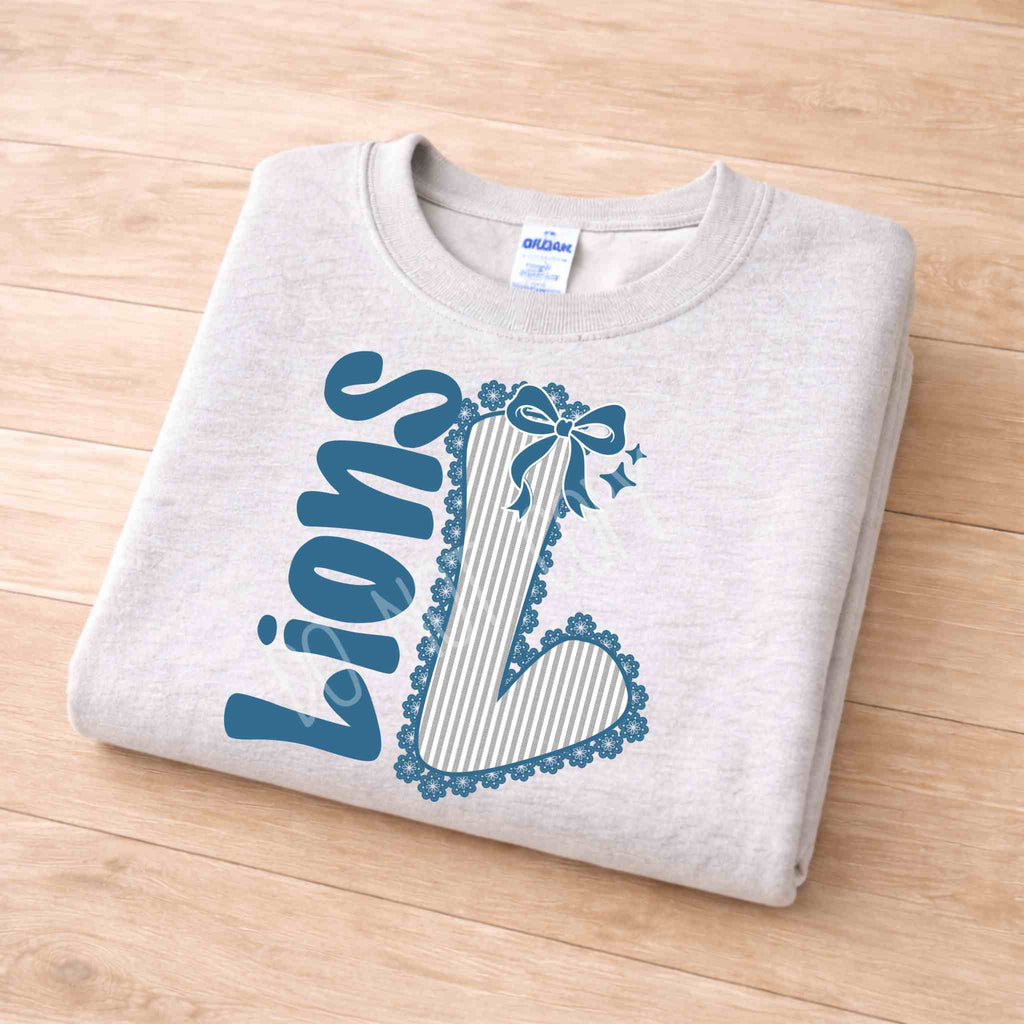 Lions School Spirit Sweatshirt with varsity L and bow detail, perfect for showing school pride in style.
