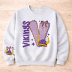 Vikings School Spirit Sweatshirt featuring varsity letter and bow accents in purple and gray.