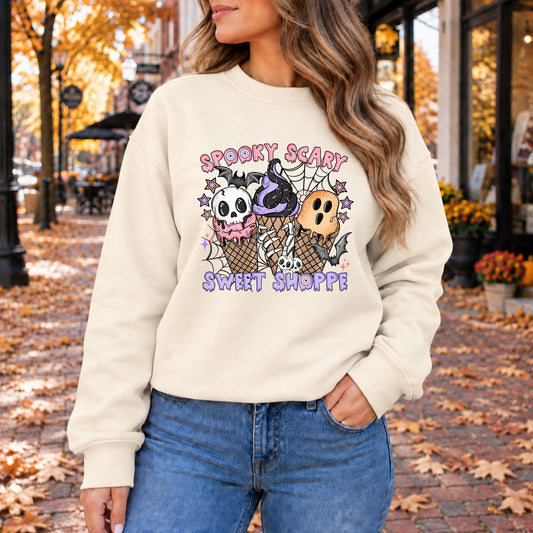 White Halloween ice cream graphic sweatshirt with long sleeves and crew neck