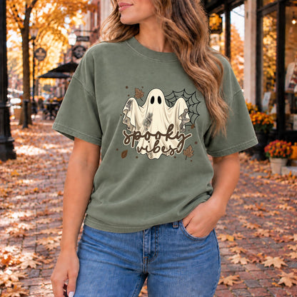 Olive green Halloween graphic tee with spooky ghost and bats print