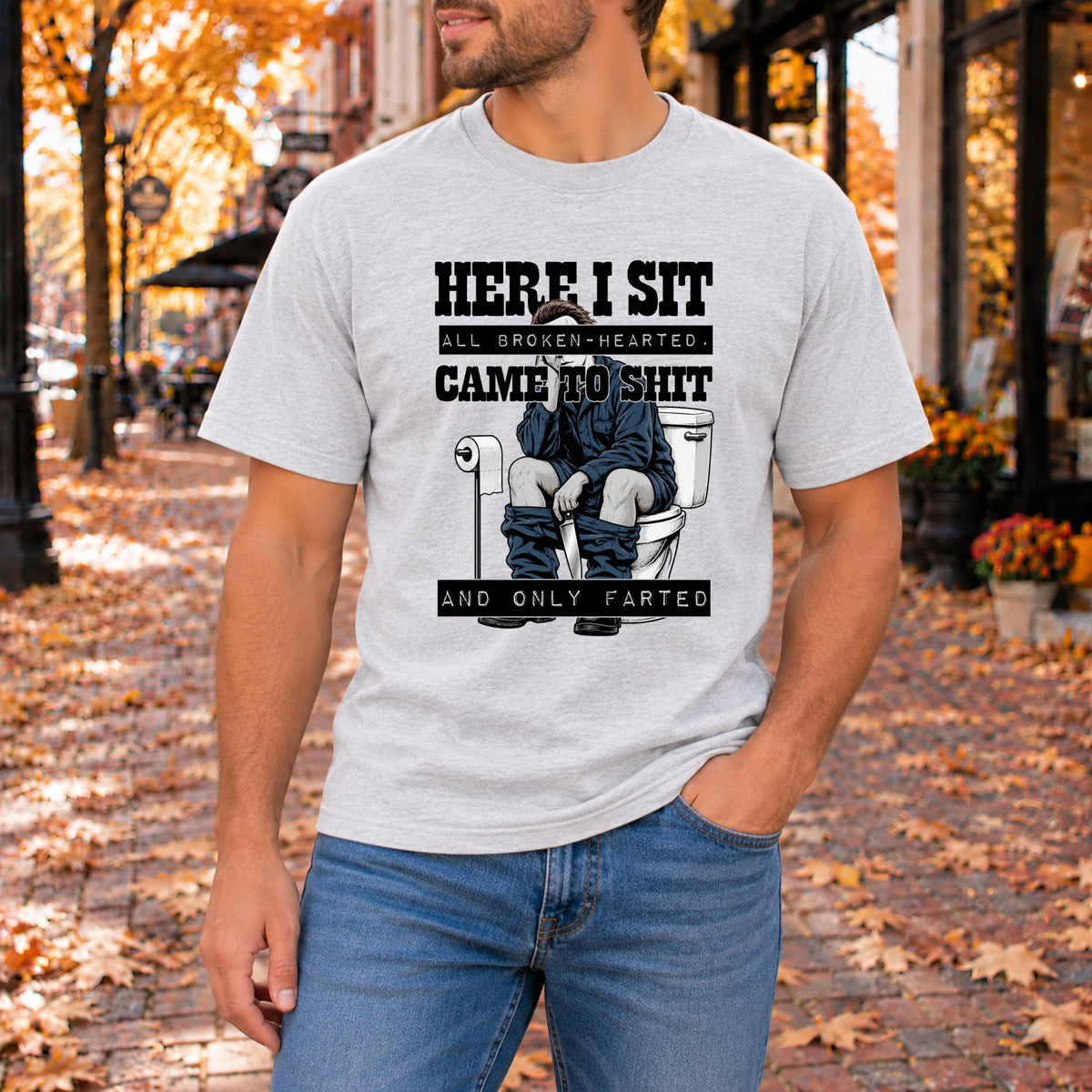 Light gray horror graphic T-shirt, 'Here I Sit' toilet text with illustration