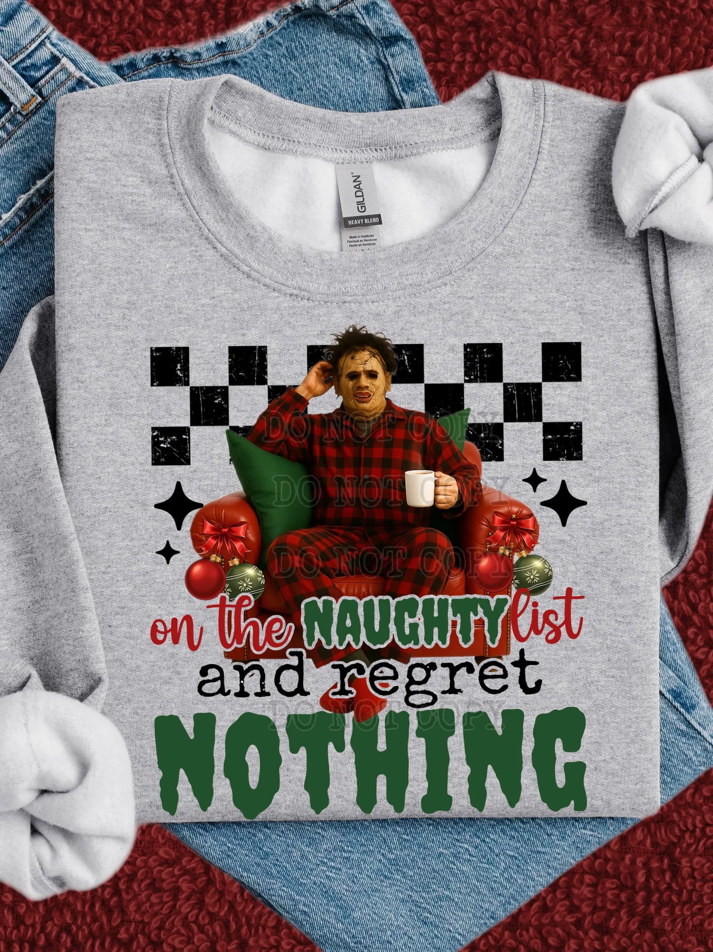 Funny Christmas Sweatshirt: Leatherface on Naughty List - Regret Nothing