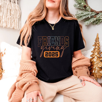 Friendsgiving 2025 T-Shirt: Stylish apparel for Friendsgiving celebrations in 2025, shown on a model wearing cozy attire.