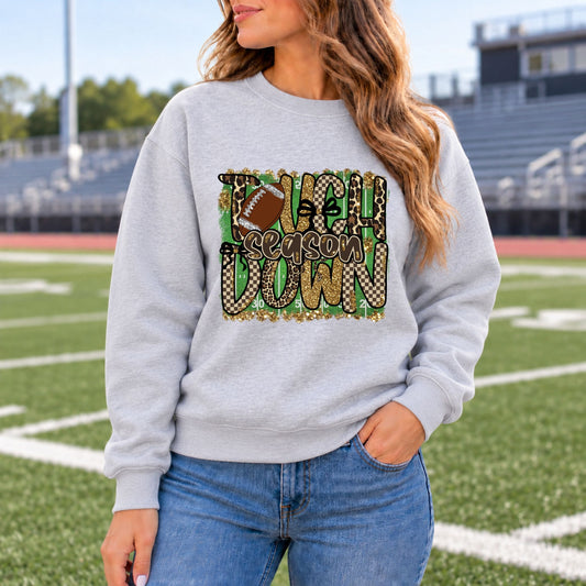 Heather gray football sweatshirt with leopard & camo 'Season' graphic