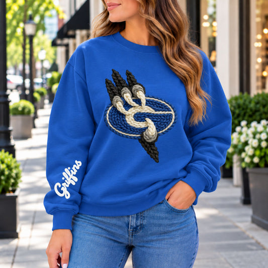 Blue crewneck sweatshirt with front griffin house emblem and white logo on left sleeve