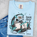 A Book a Day Keeps Reality Away Comfort Colors Graphic Tee | Book Lover Shirt