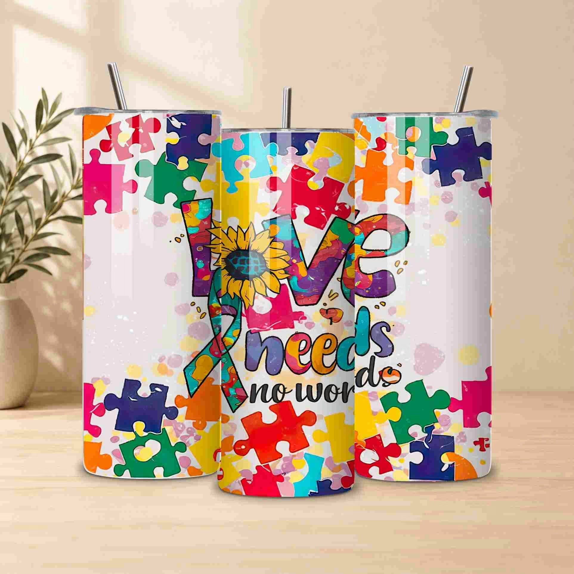 The 20oz "Autism Awareness Love Needs No Words" tumbler by Becca's Banging Designs LLC features vibrant puzzle pieces, a sunflower, and ribbon—making it a perfect autism support gift.