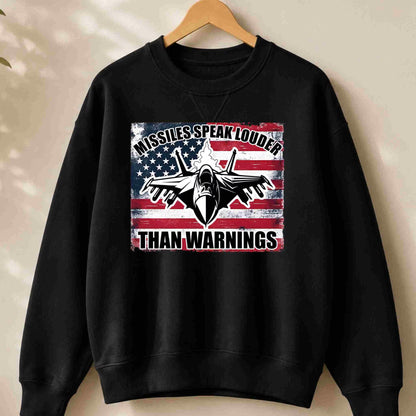 Black sweatshirt with a graphic design featuring an airplane and text on a beige background