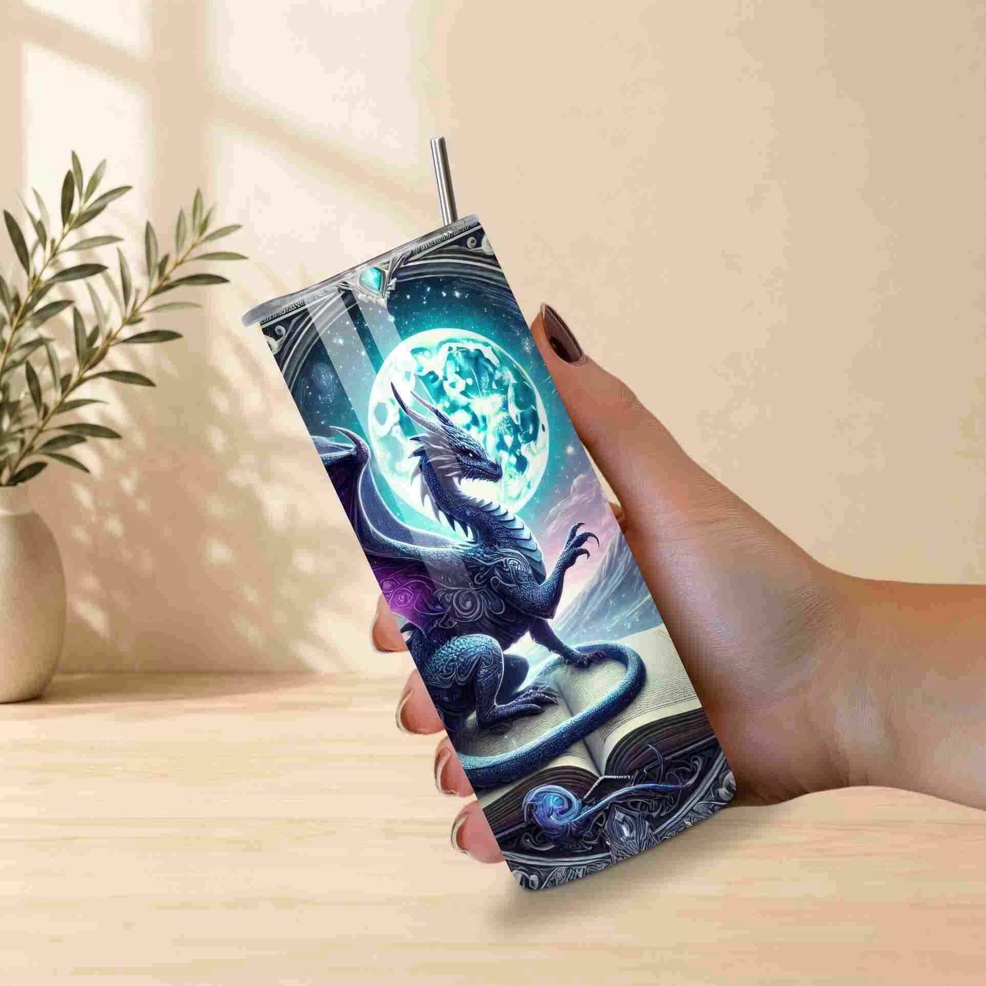 Tumbler with dragon design held by a hand on a light wooden surface.
