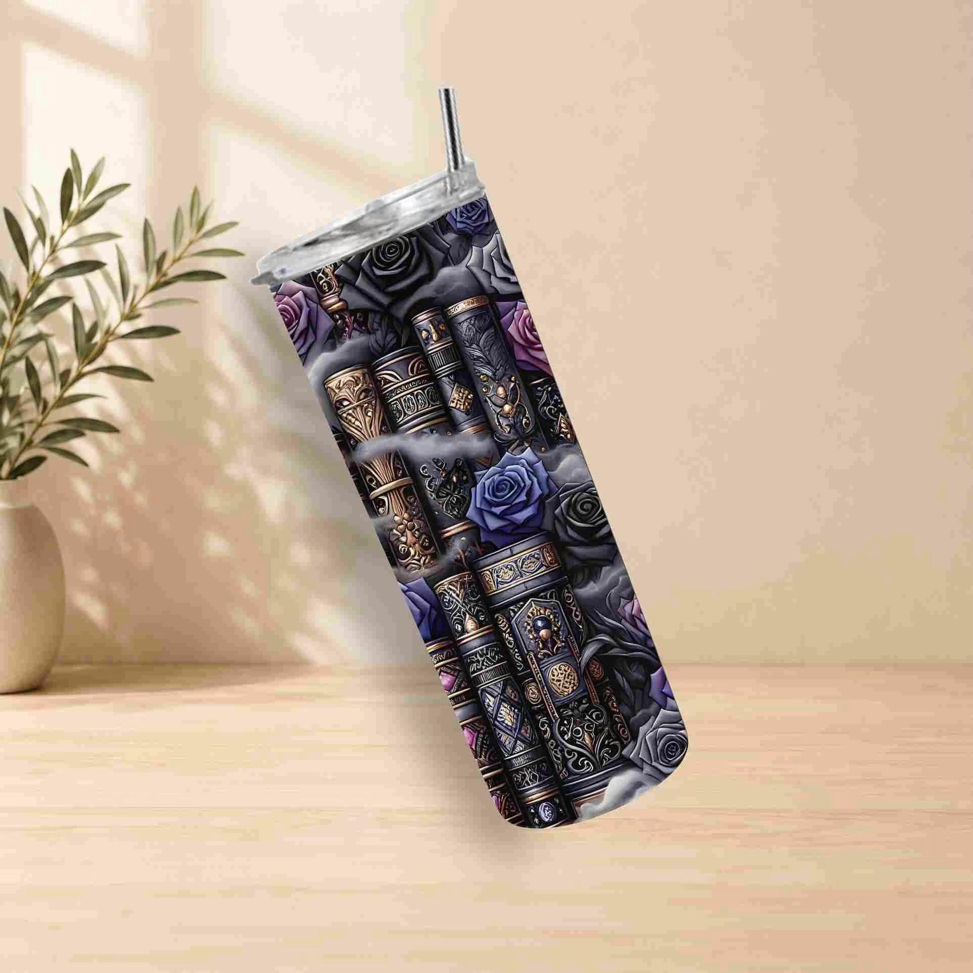 The Dark Book Lover 20oz Skinny Tumbler by Becca's Banging Designs LLC features ornate books, blue and purple roses, and gold accents. With a lid and straw, it’s the perfect gothic addition to any book lover's collection.