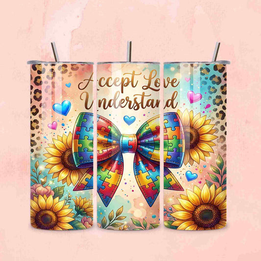 Set of three 20oz Autism Awareness Sunflower Tumblers by Becca's Banging Designs LLC, featuring puzzle bow designs, colorful puzzle pieces, blue & pink hearts, cheetah print accents, and "Accept Love Understand" text.