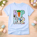 Easter Bunny HOP shirt in light blue with playful bunny, carrot detail, and festive pastel letters.