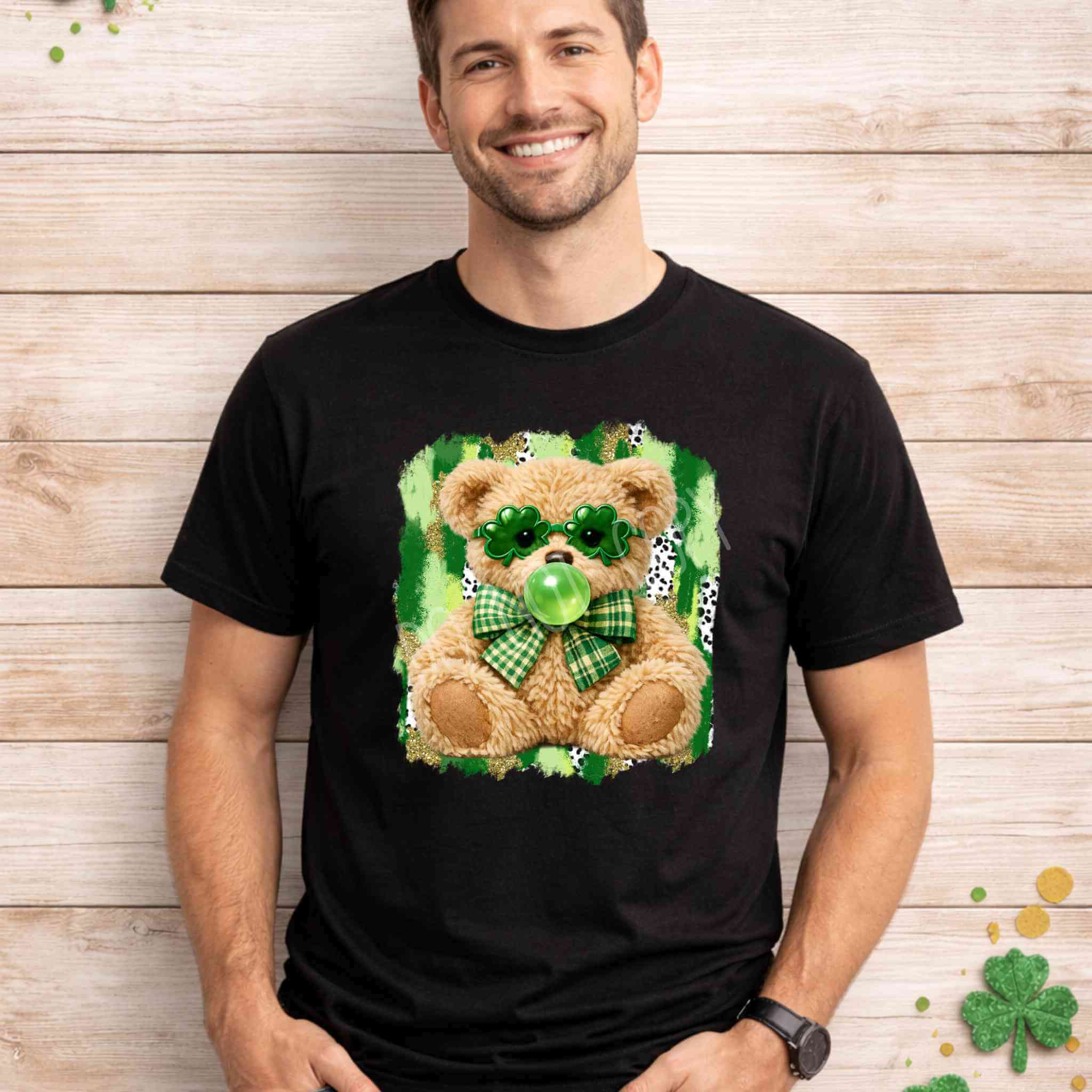 St. Patricks Day Teddy Bear Shirt featuring a teddy bear with shamrock glasses and a green bow on a playful background.