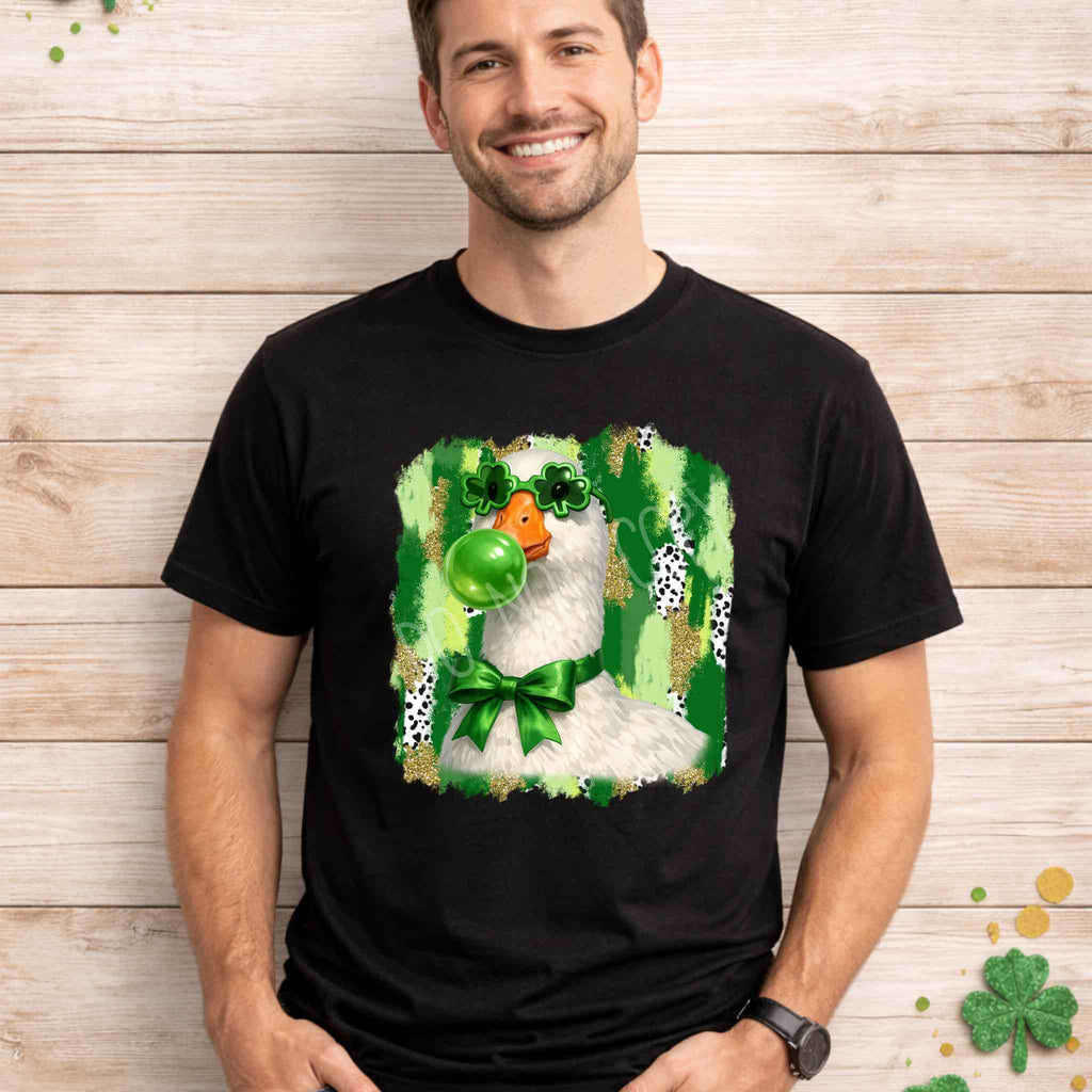 St. Patricks Day Goose Shirt featuring a goose with shamrock glasses and a green bow on a black tee.