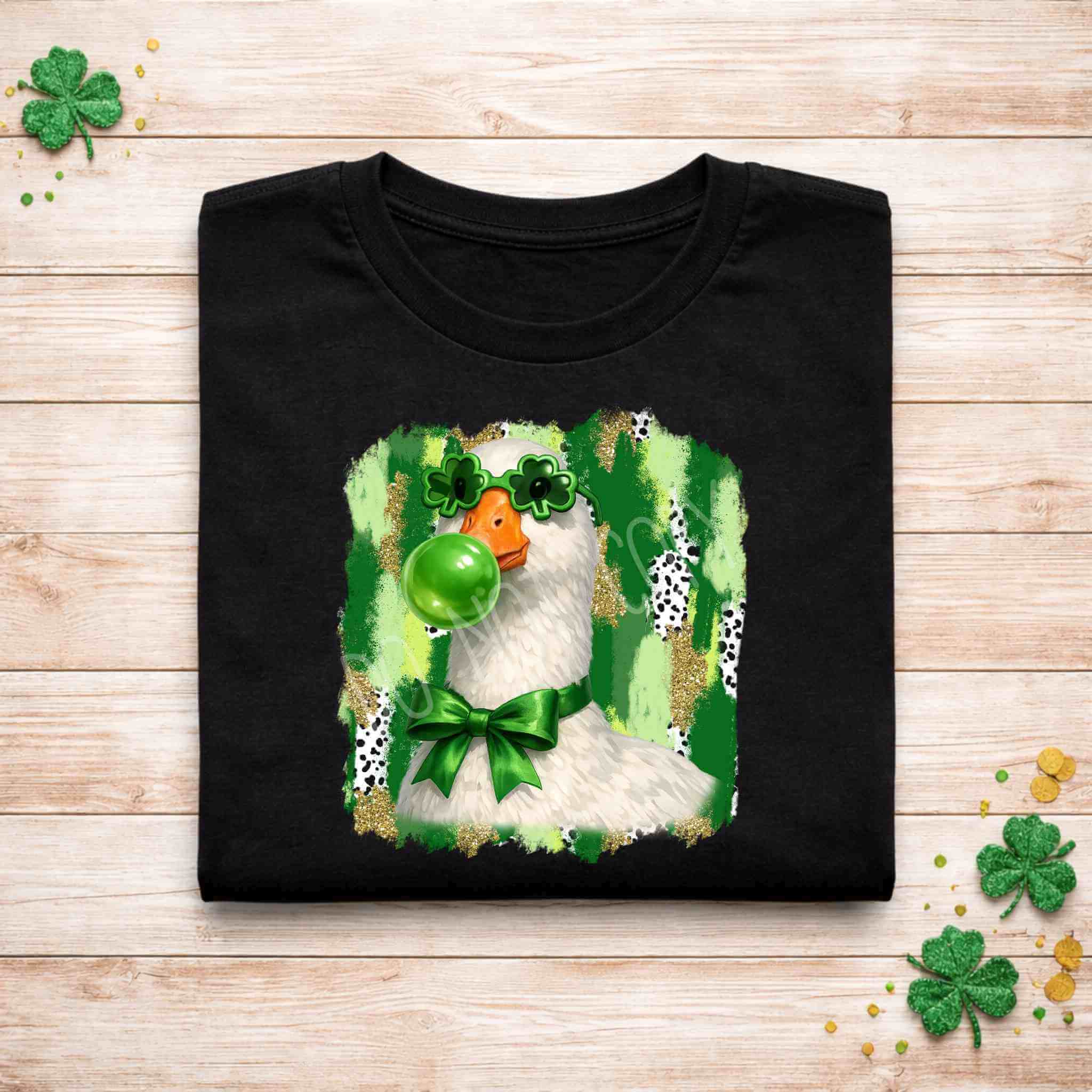 St. Patricks Day Goose Shirt featuring a cute goose with shamrock sunglasses and bubblegum on a black tee.