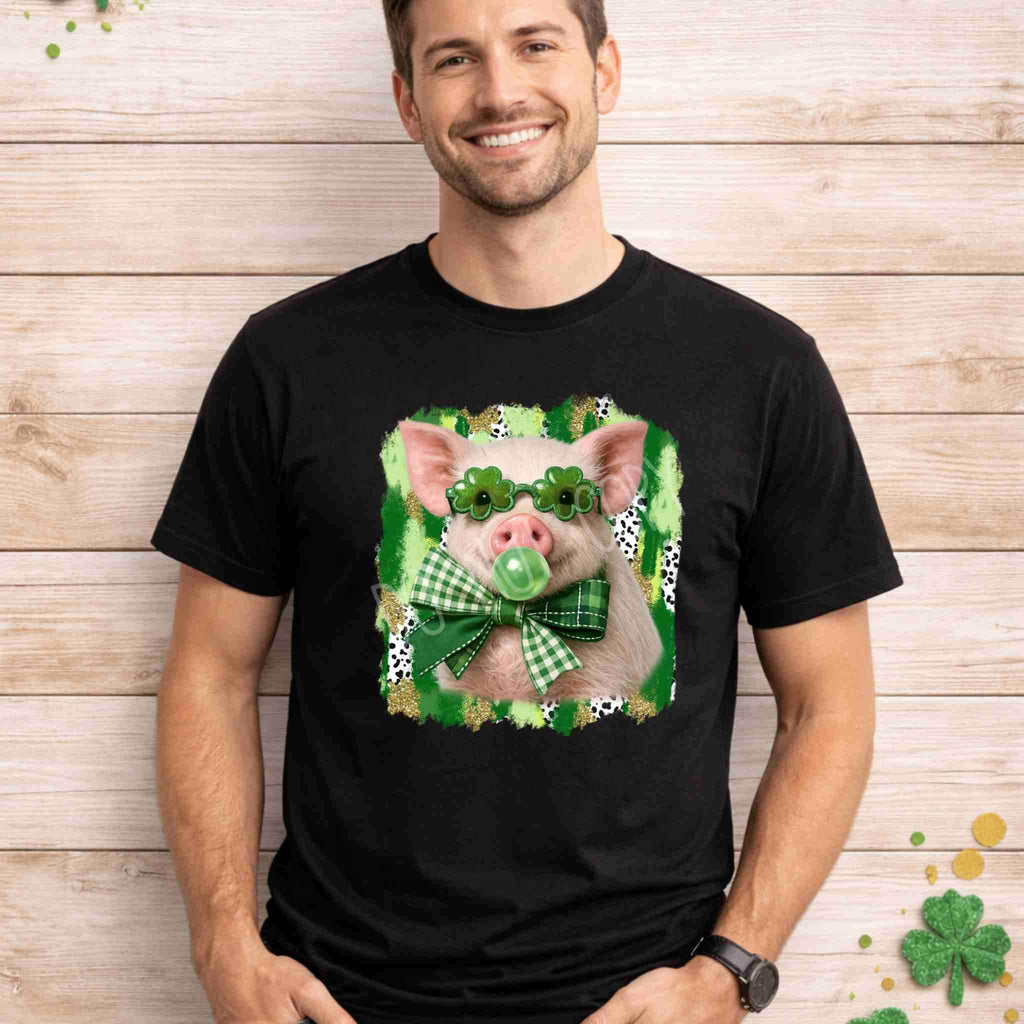 St. Patricks Day pig shirt featuring a pig in shamrock glasses and a green bow tie against a festive background.