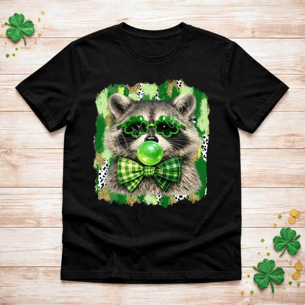 St. Patricks Day Raccoon Shirt featuring a cute raccoon wearing shamrock glasses and a green bow tie.