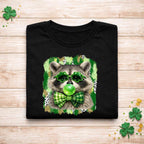 St. Patricks Day Raccoon Shirt featuring a cute raccoon with shamrock glasses and a bow tie on a black tee.