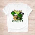 St. Patricks Day shirt featuring frothy beer, shamrocks, and a leprechaun hat in a fun design.