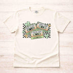 St. Patricks Day shirt featuring a retro cassette tape graphic with shamrocks and checkered accents.