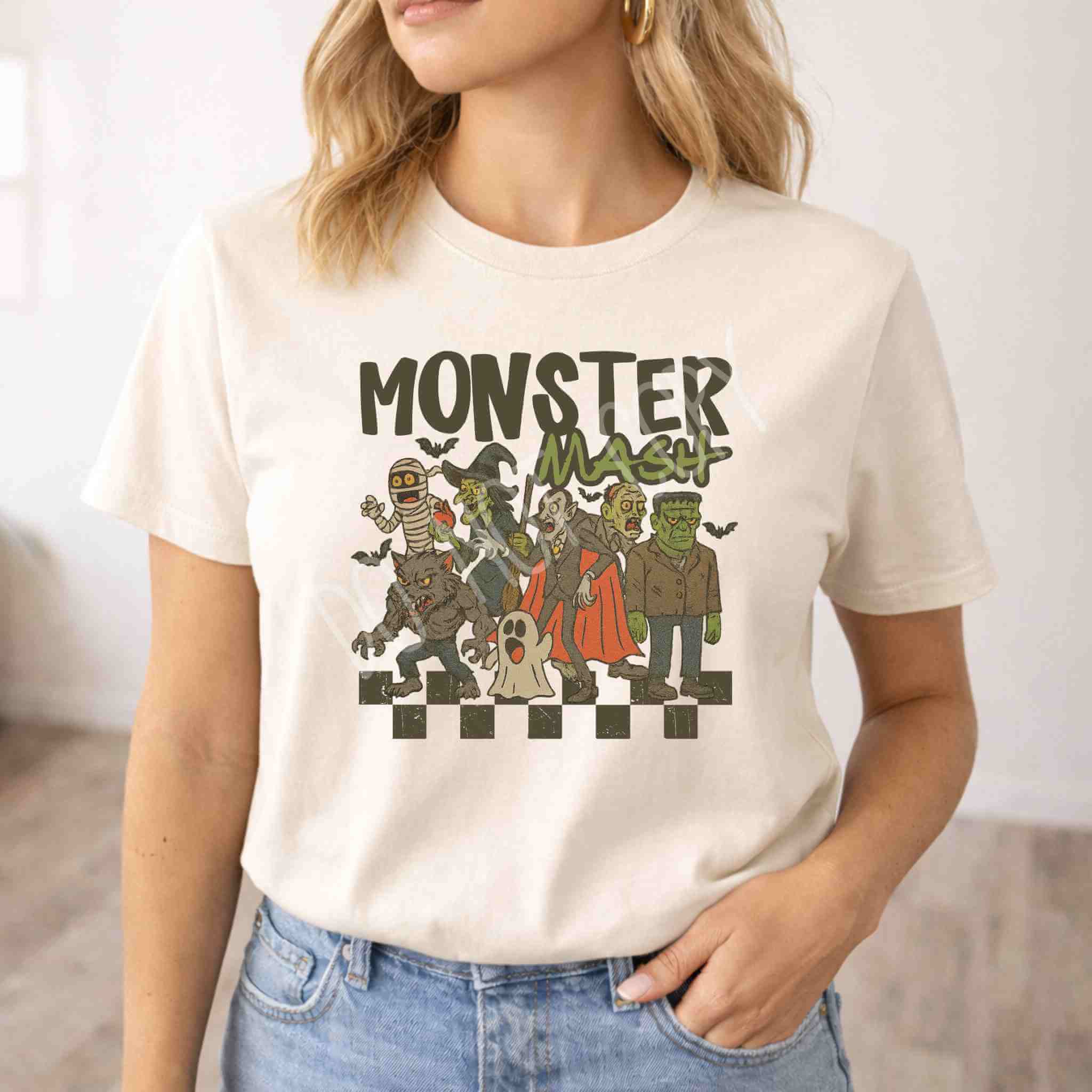 Model wearing a Monster Mash T-Shirt featuring classic Halloween characters and playful design.