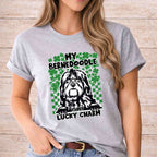 St Patricks Day dog lover shirt featuring a Bernedoodle and text 'My Bernedoodle Is My Lucky Charm' with green shamrocks