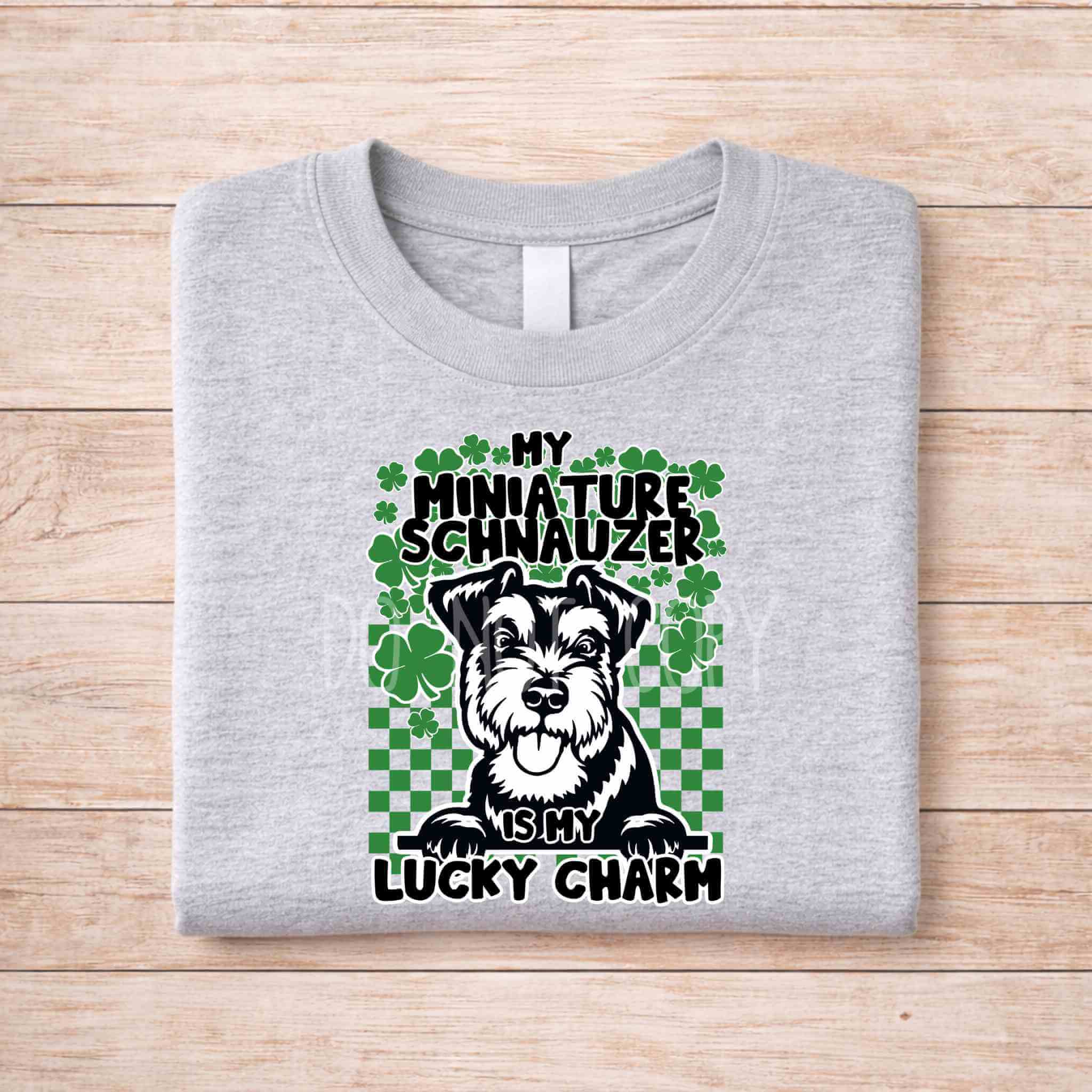 St Patricks Day dog lover shirt featuring a Miniature Schnauzer and the text 'My Miniature Schnauzer Is My Lucky Charm'