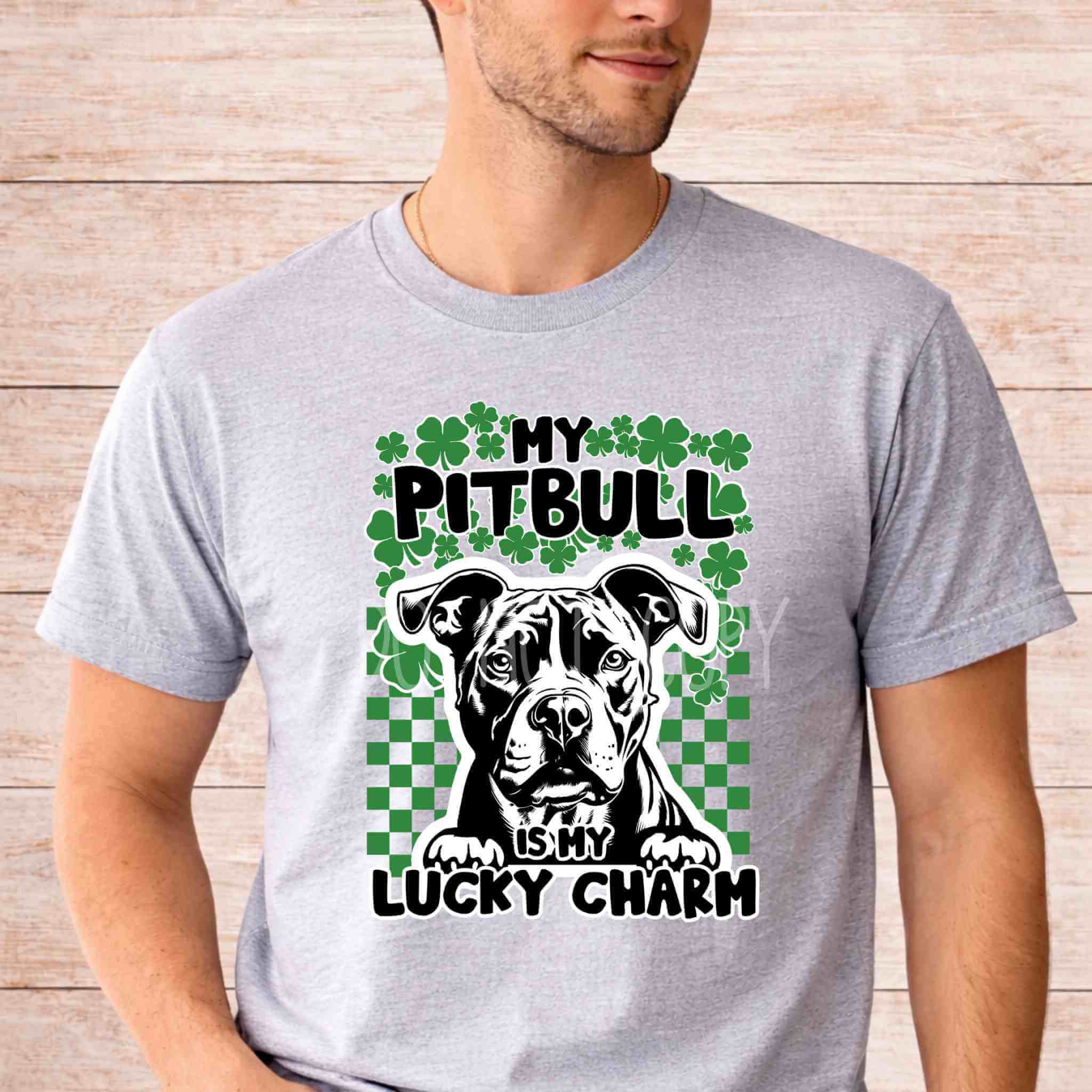 St Patricks Day dog lover shirt featuring a Pit Bull with the text 'My Pitbull Is My Lucky Charm' decorated with shamrocks.