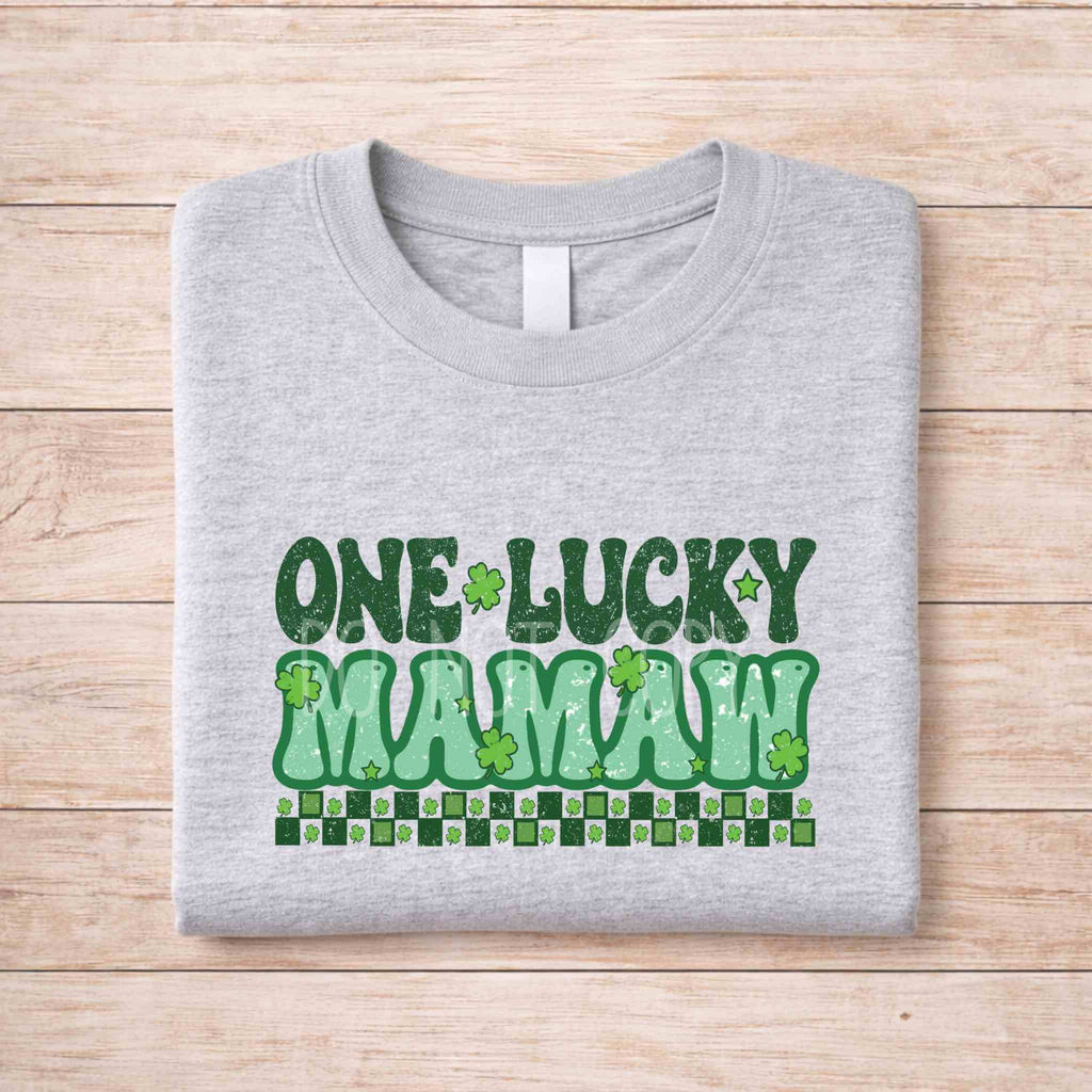 St. Patricks Day matching tee featuring retro lettering and shamrock accents in green.